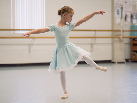 u2933761673_A_10-year-old_girl_practicing_steps_in_ballet_cla_f0934da0-d909-42ec-a2e0-f6a4f636b40a_3 (1).png